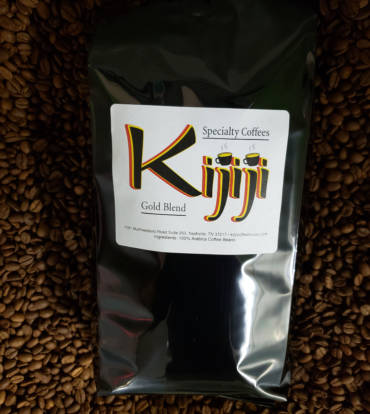 Bag of Kijiji Gold Blend Coffee laying on top of coffee beans